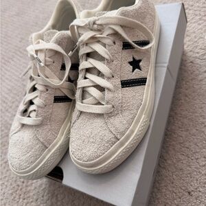 Converse Cream Sneakers with Black Accents